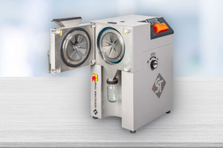 Disc mill SBM 200 Open view View of the grinding mechanism App control, HMI, gap width adjustment, grinding discs, tungsten carbide, WC, safety sensor, feed hopper