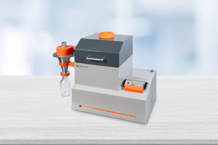 A laboratory universal mill with an attached cyclone separator and a sample collection bottle.