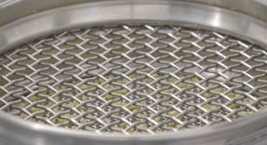 Analytical screening machines View of the screening tower and zirconium oxide beads